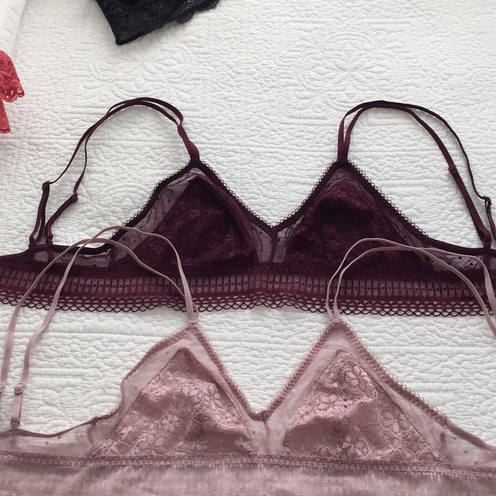 Two Victoria’s Secret lace bralettes